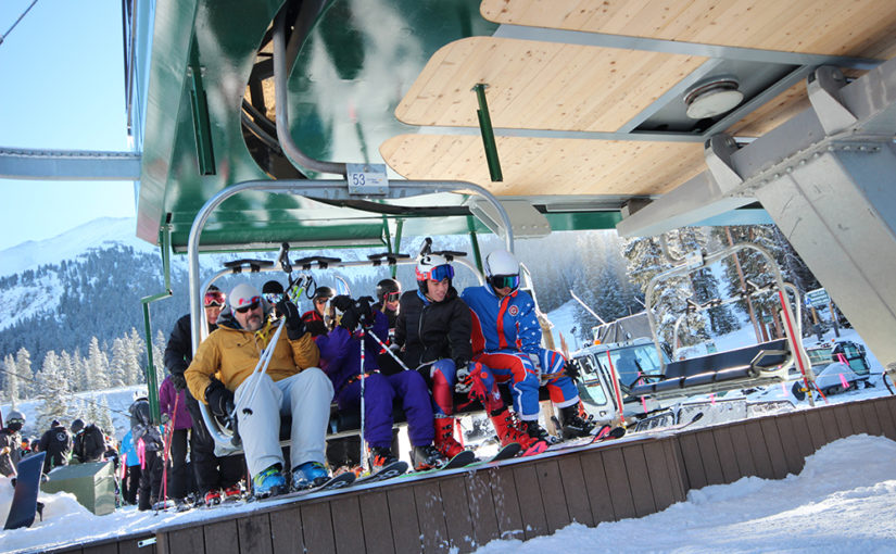 Skiers and Riders on the Black Mountain Express Chair Lift